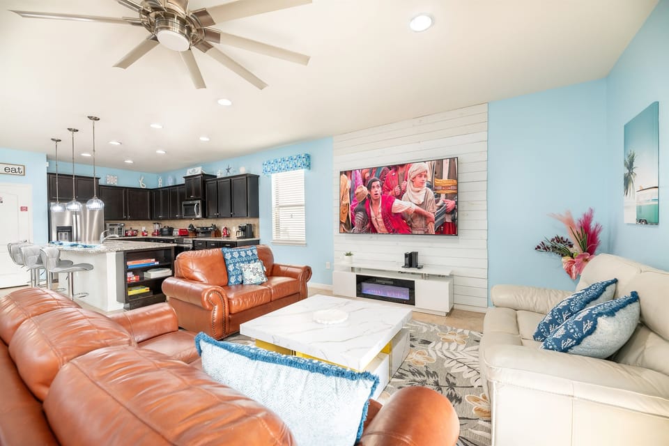 Living area with huge 85 inch TV