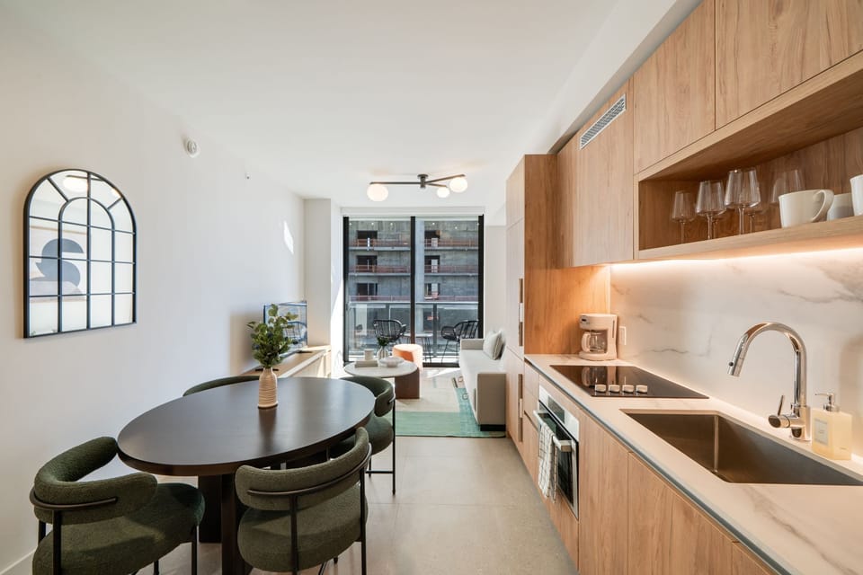 Fully equipped kitchen with island and city views