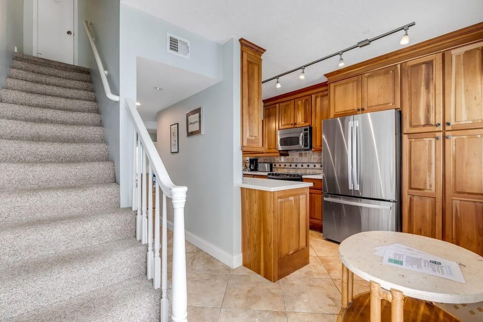 Cozy kitchen and dining nook with warm wood accents