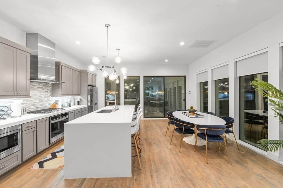 Large kitchen island, open to dining , comfortably seats 10 for dining. 