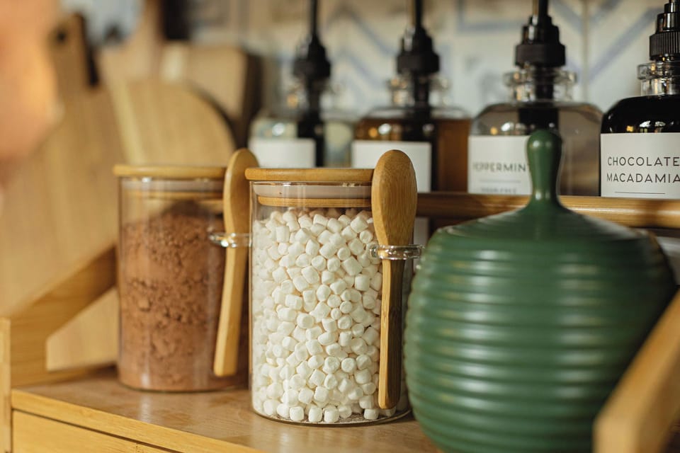 Enjoy coffee syrups, hot coco, and mini marshmallows.