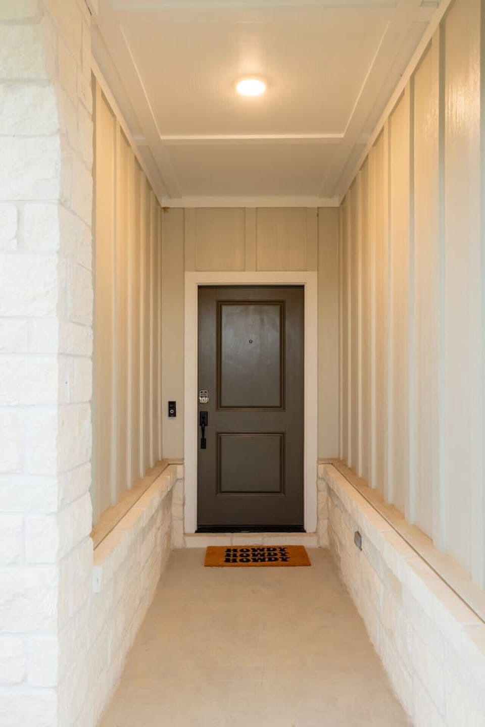 The well-lit entry features a convenient keypad, offering easy, secure access for a smooth and hassle-free arrival.