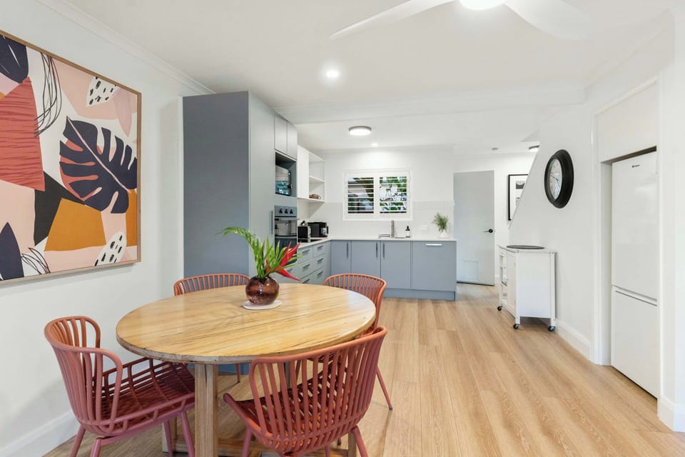 Open plan living and dining area with modern finishes.