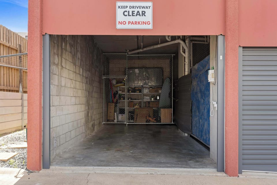 Secure single garage provided for guest use.