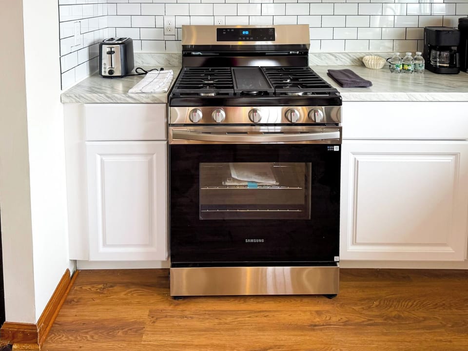 Fully equipped kitchen with everything needed for cooking and entertaining.