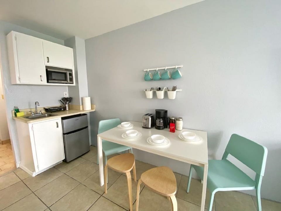 Prepare meals with ease in this fully stocked kitchen.
