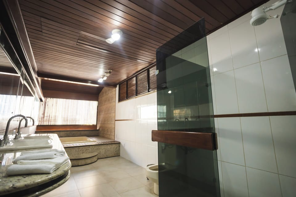 Family Quadruple Room, Courtyard View | Bathroom | Towels, soap, toilet paper