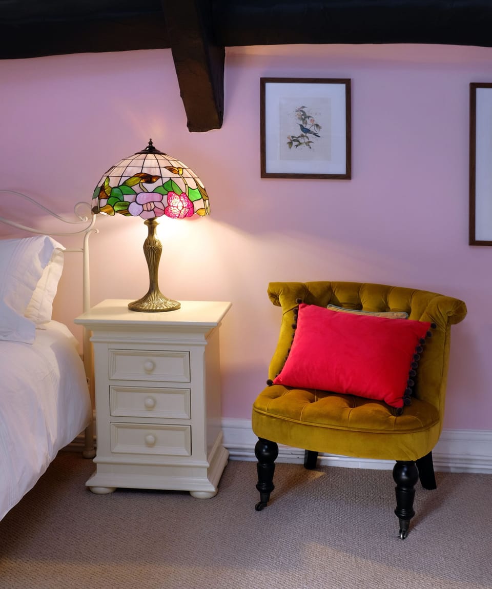 Period Leadlight lamps throughout the cottage create a warm, homely feel.