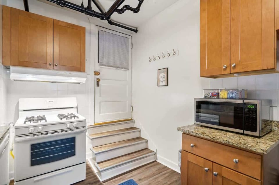 If your bucket list includes 'taking overhead pictures of cooking food without using a step stool'....well, we have that covered.  Door goes to the outside.