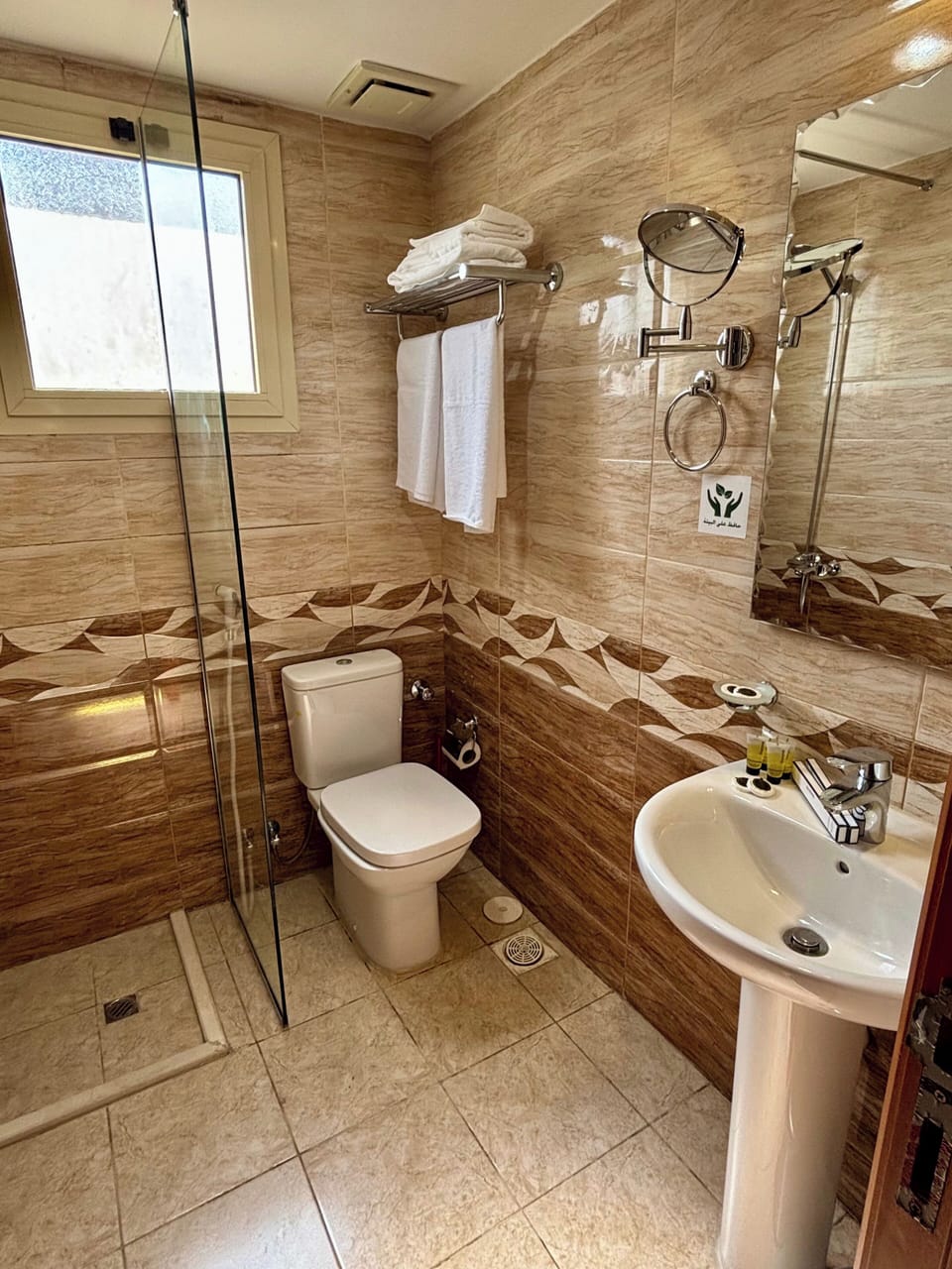 Hair dryer, towels, soap, shampoo