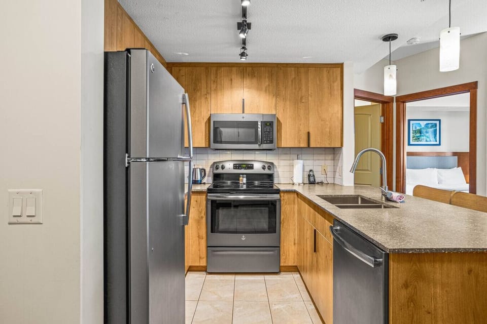The fully-equipped kitchen is perfect for your culinary needs.