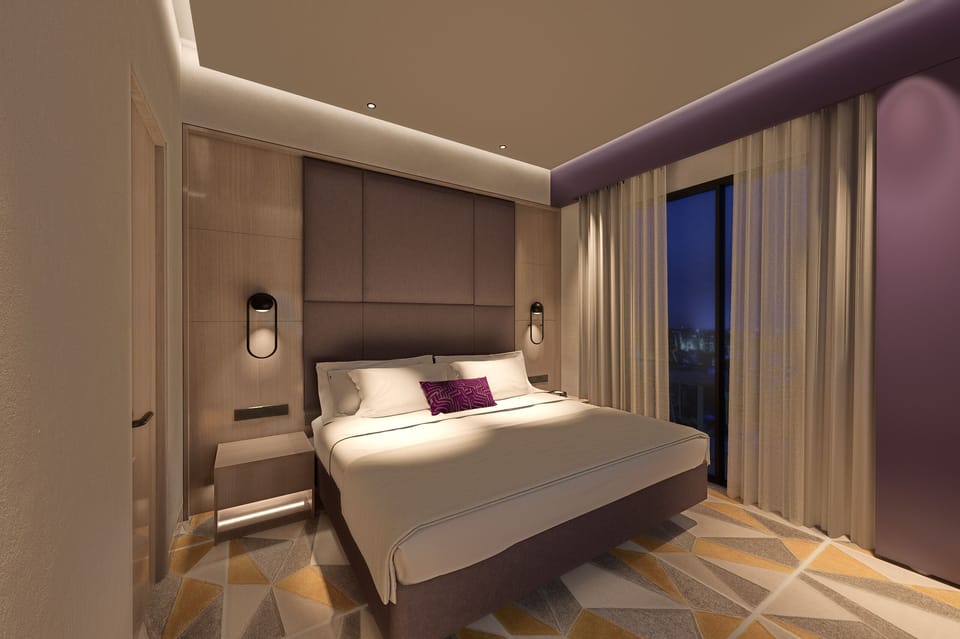 Deluxe Suite | Premium bedding, minibar, desk, laptop workspace