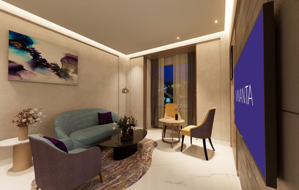 Premium Suite | Living area | 50-inch Smart TV with cable channels