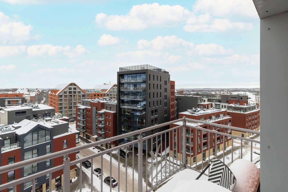 The balcony provides a perfect spot for enjoying the fresh air.