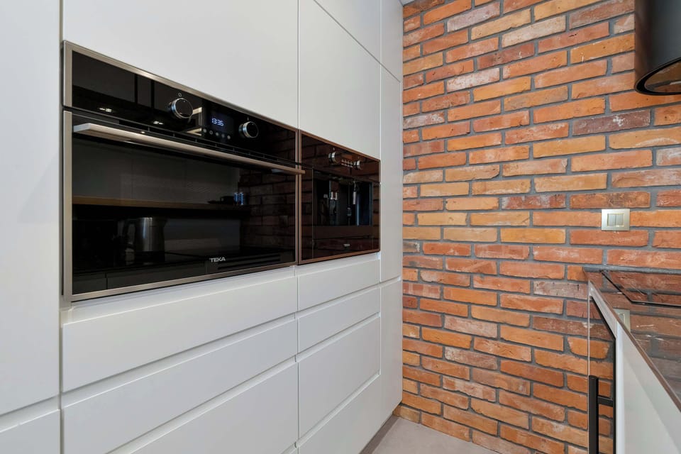 The kitchenette's practical layout maximizes space and functionality.