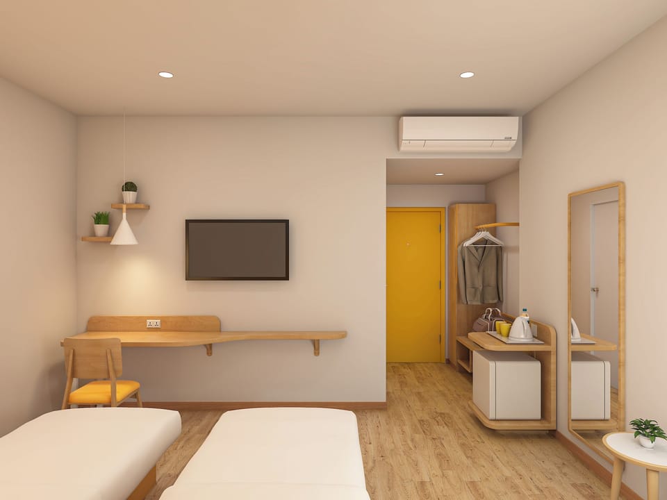 Deluxe Twin Room | Desk, laptop workspace, iron/ironing board, free WiFi