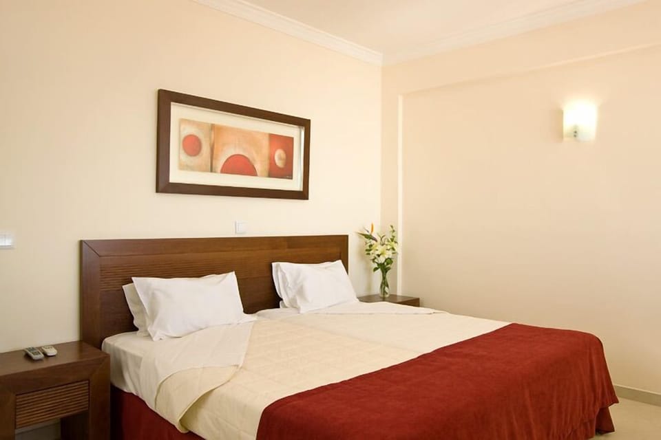 In-room safe, blackout drapes, iron/ironing board, bed sheets
