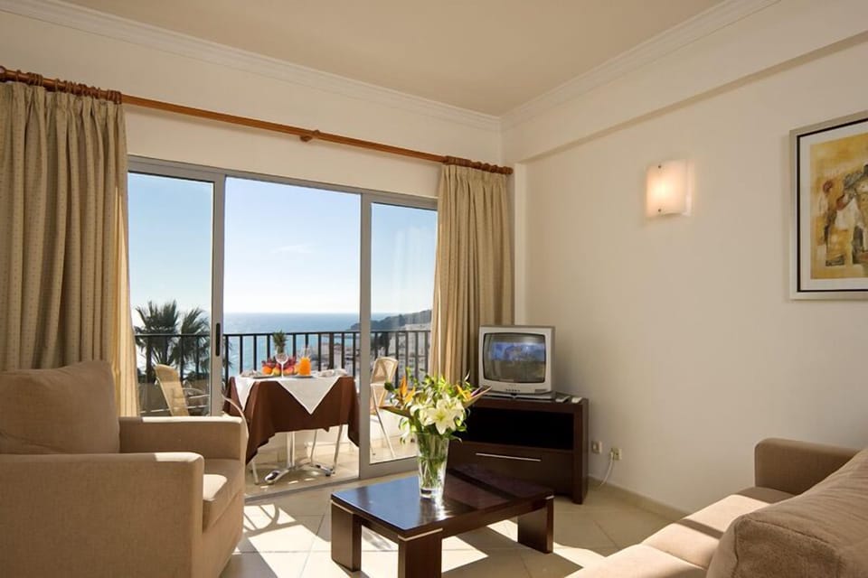 Apartment, 2 Bedrooms | Living room | Flat-screen TV
