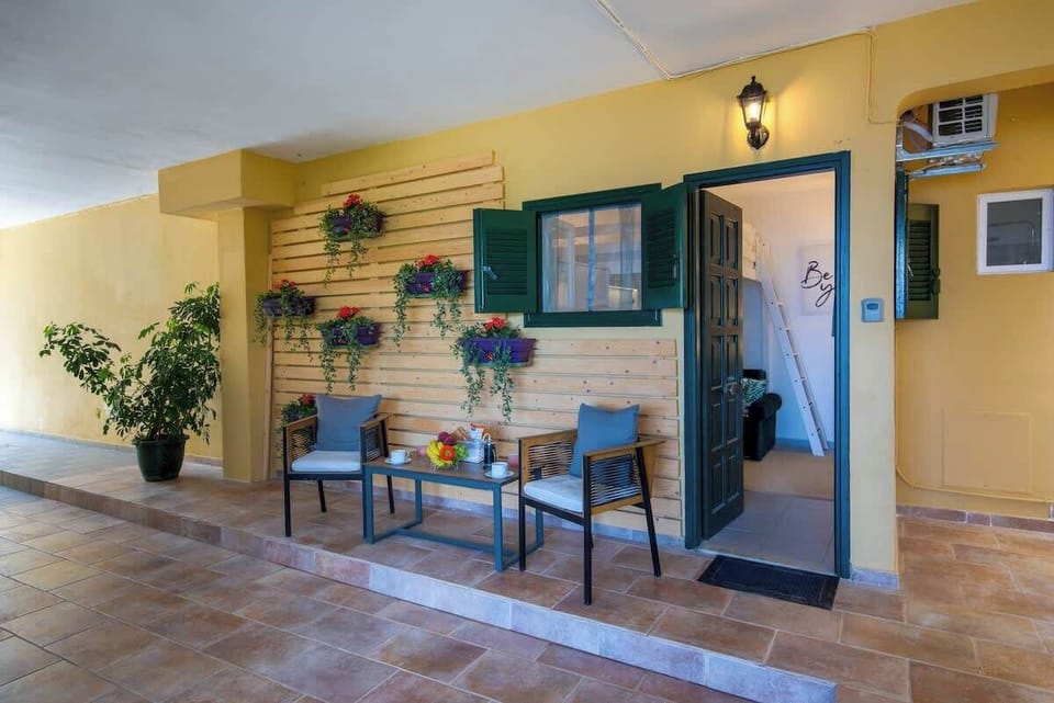 Private Terrace with Dining Table and Relaxing Outdoor Lounge