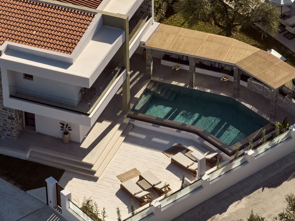 Design-led sanctuary in Agios Sostis, crafted for slow, sunlit living.