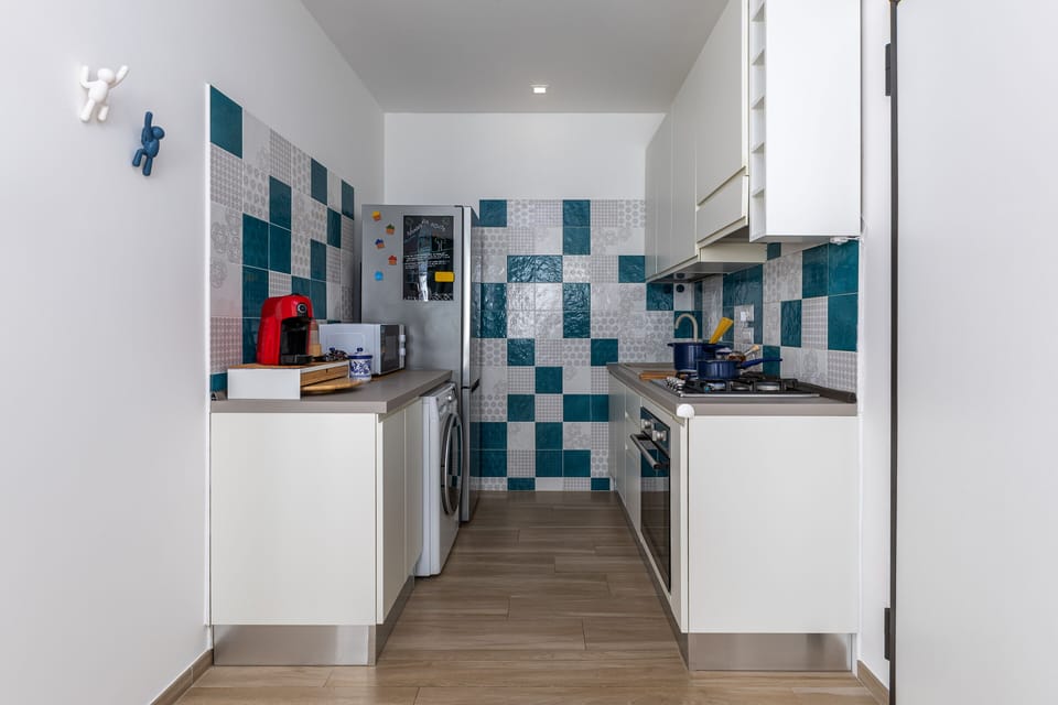 Apartment, 2 Bedrooms, Patio | Private kitchen | Full-size fridge, microwave, oven, stovetop