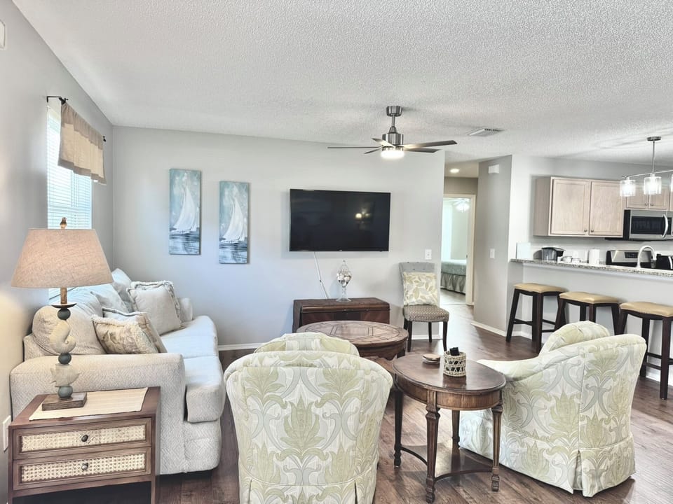 Living Room w/ Sleeping Quarters Down the Hall to the Right