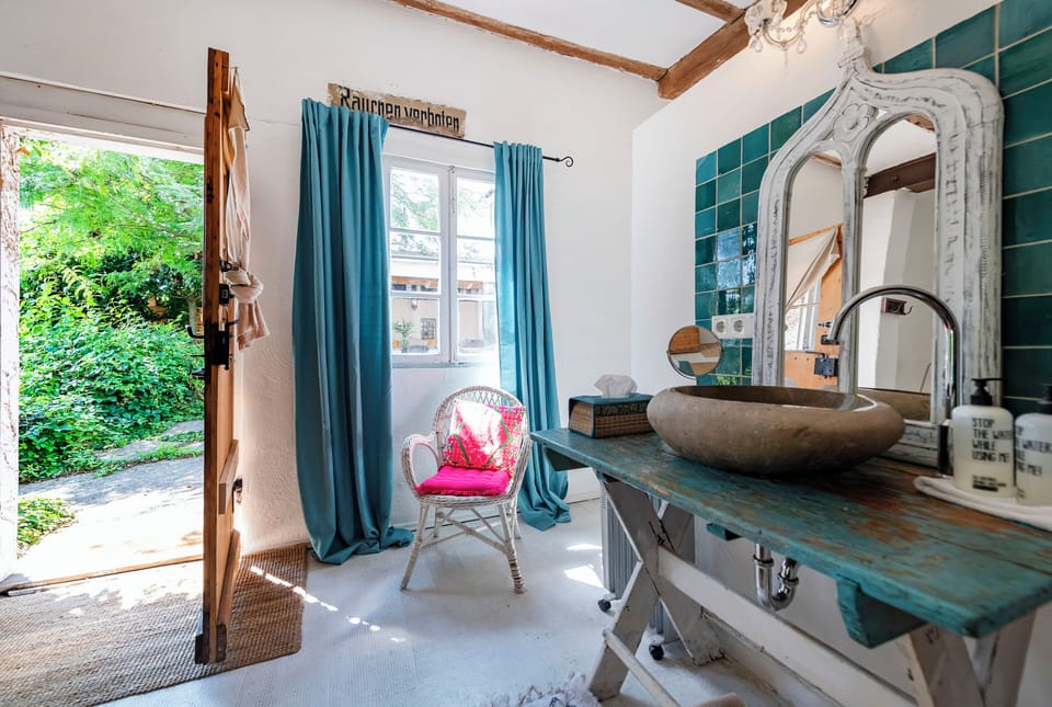 Signature Room | Bathroom | Hair dryer, towels