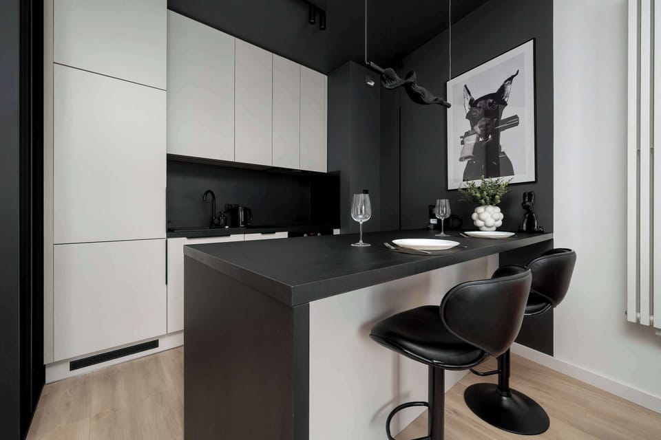 The kitchenette's practical layout maximizes space and functionality.