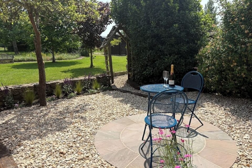 Private patio area with firepit