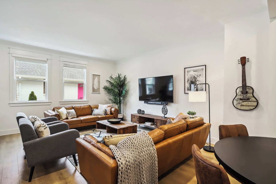 Unit B Living Room | Comfortable Seating Area and TV | First Floor