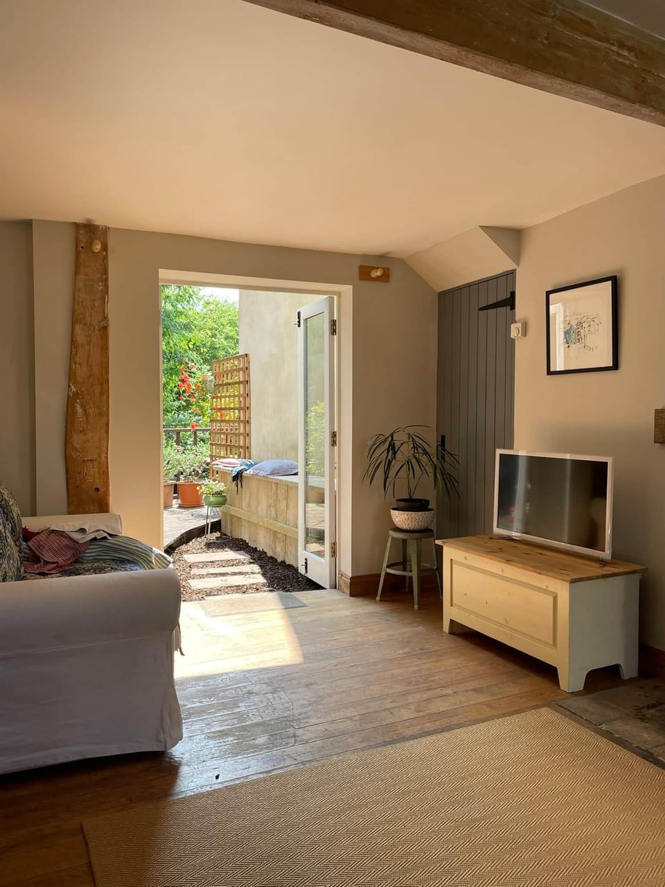 French doors open out of the living room onto the deck