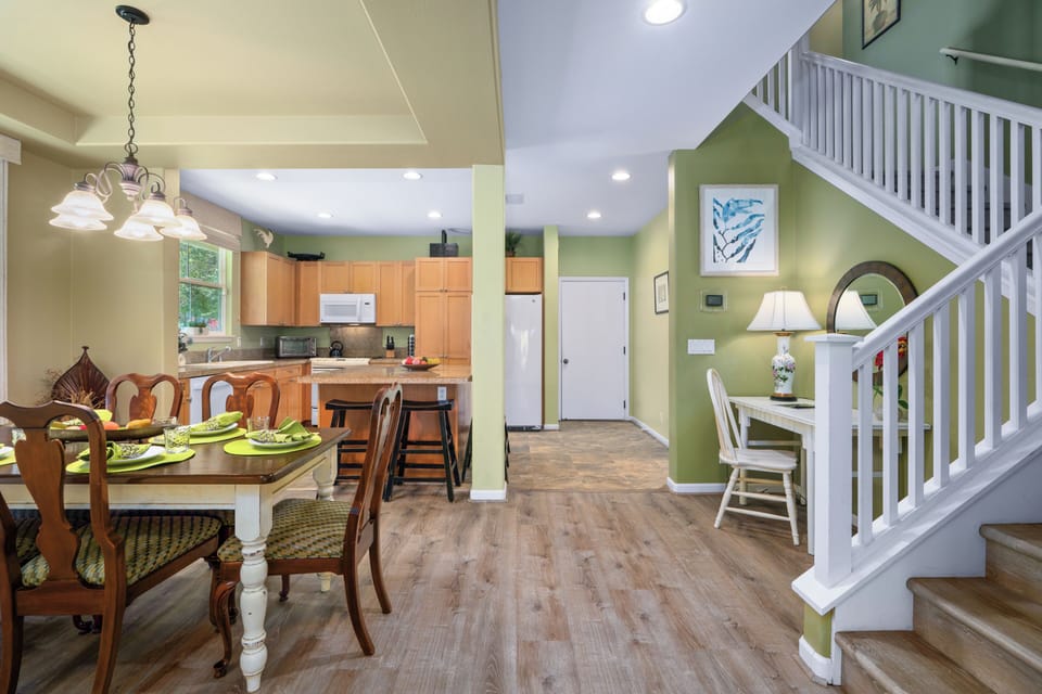 Gather around your spacious dining table while the chef in your group creates meals in the open kitchen nearby.
