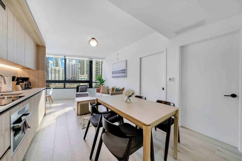 "Our spacious dining room flows seamlessly into the kitchen and living area, making it the perfect spot for morning coffee or a social dinner with a view.