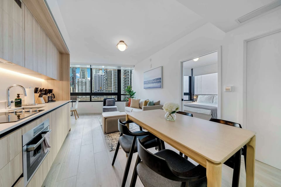 Enjoy a seamless flow between our sleek, open-concept kitchen and the elegant dining area perfect for sharing home-cooked meals and good conversation