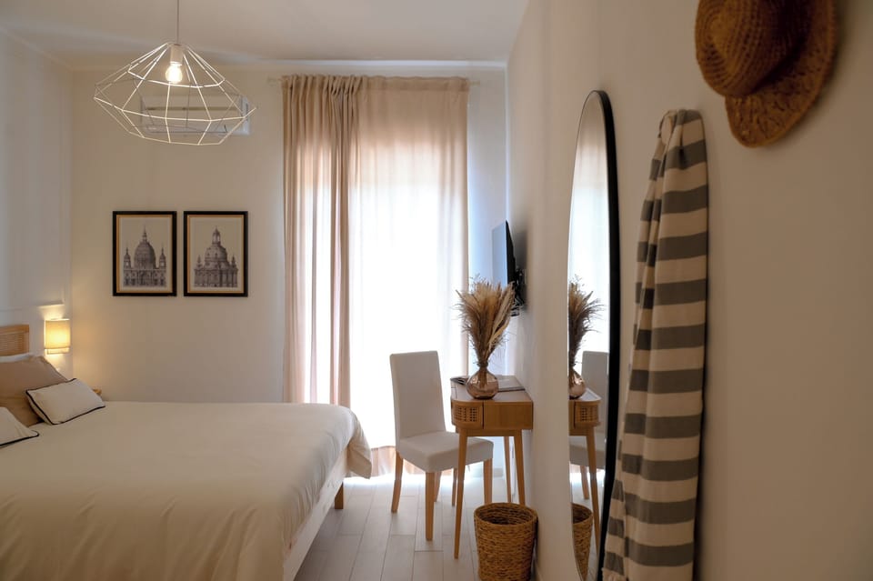 Triple Room, Balcony, Sea View | Free minibar, in-room safe, laptop workspace, blackout drapes