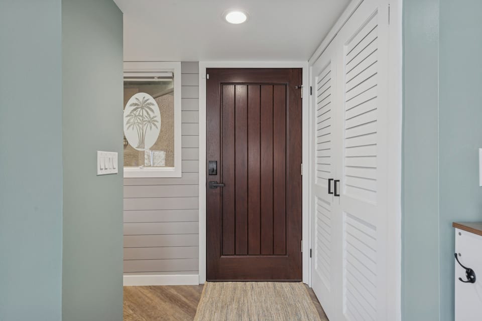 The Boarding Hall - A welcoming transition space that sets the tone for the nautical experience.