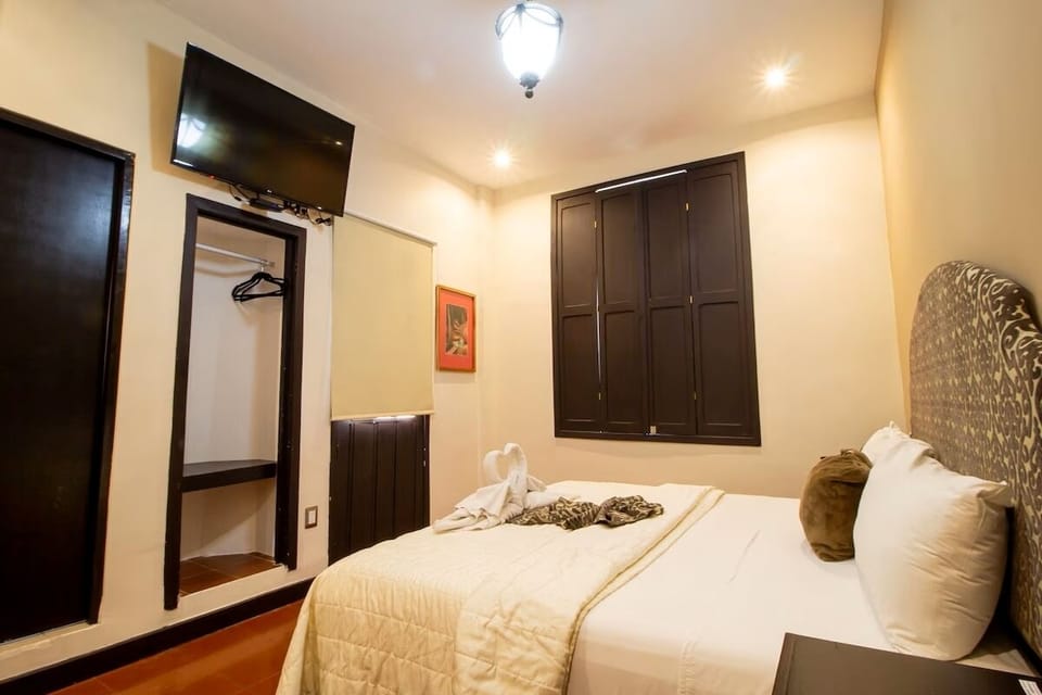 Kick back with in-room TV and easy, open storage