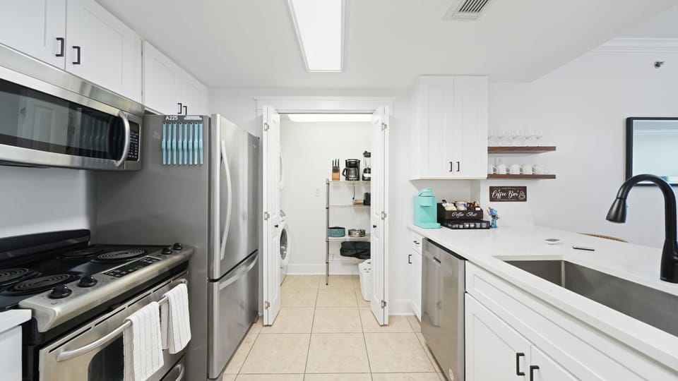 A spacious kitchen and bar invite easy meals and relaxed conversation