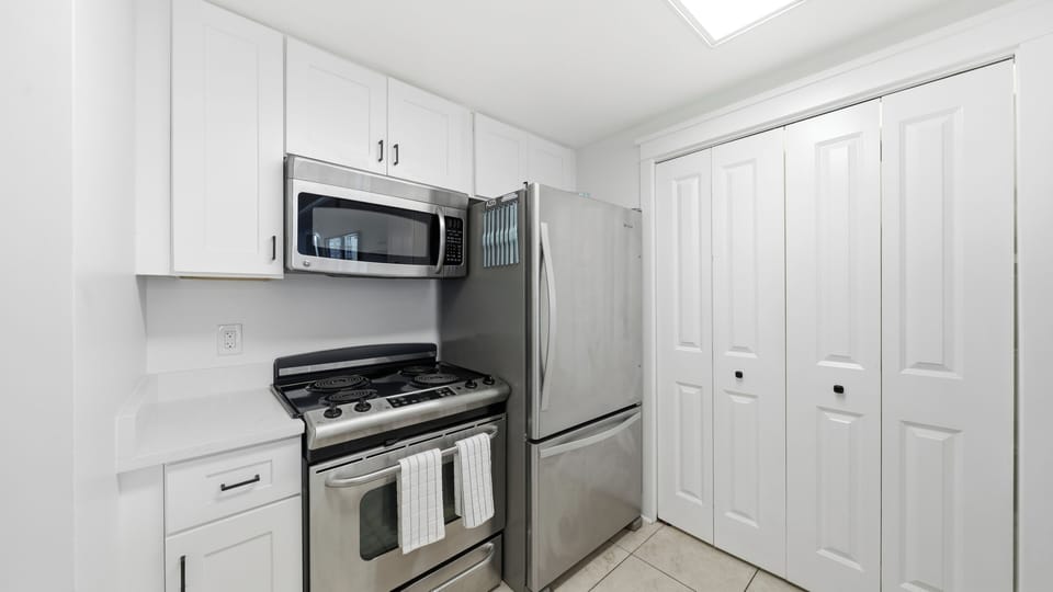 Cook, snack, and unwind in a kitchen designed for laid back beach days