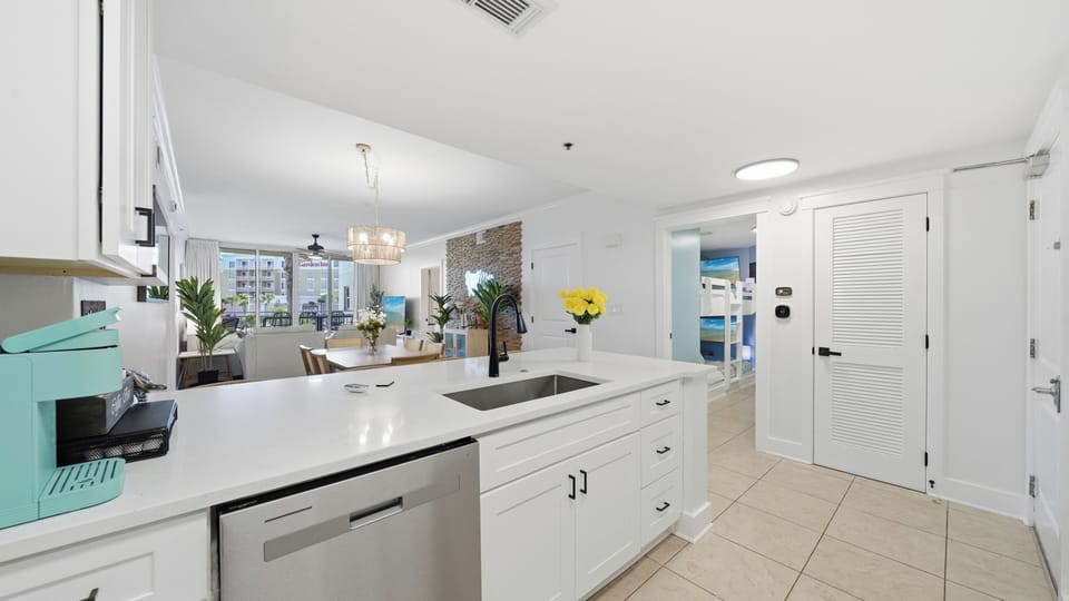 Gather in the bright kitchen where meals and memories are made together