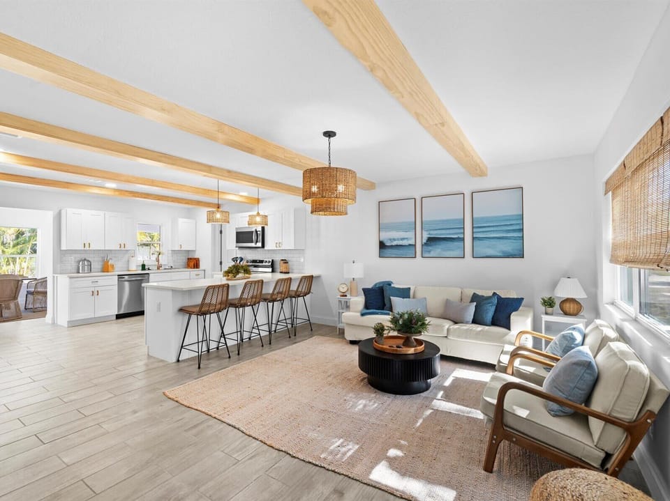 Seaside-inspired interior with soft neutrals, blue accents, and natural textures.