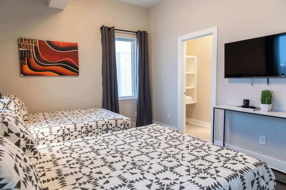 Bedroom 3 - 2 Full Beds with private bathroom. 