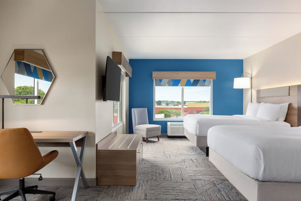 Suite, Multiple Beds | Desk, laptop workspace, blackout drapes, iron/ironing board