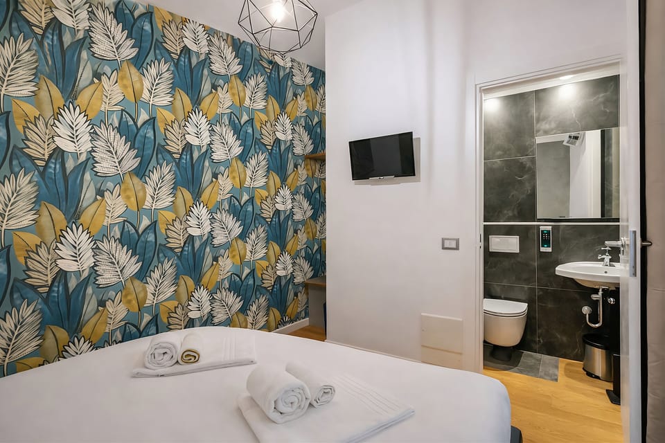 Classic Double Room, 1 Queen Bed, Private Bathroom | In-room safe, blackout drapes, soundproofing, iron/ironing board