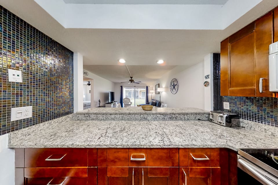 Condo, Multiple Beds, Patio, Garden View (Pelican's Cove C118) | Private kitchen