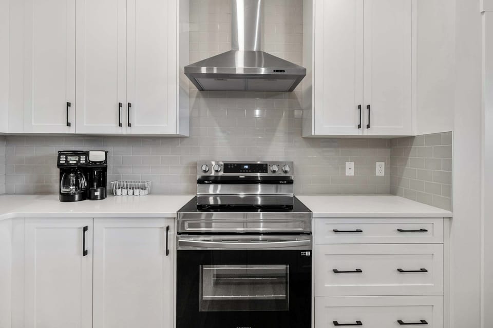 Fully Equipped Kitchen with Stove, Oven & Hood Fan
