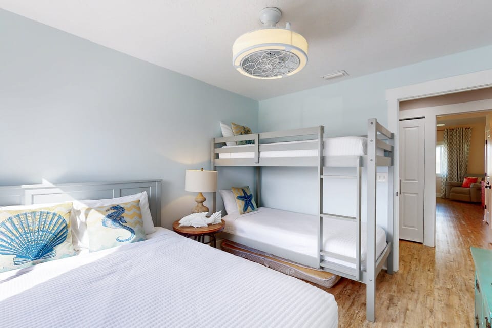 Condo, Multiple Beds, Pool Access, Pool View (Summerhouse Beach & Racquet Club #223) | 2 bedrooms, individually decorated, individually furnished, bed sheets