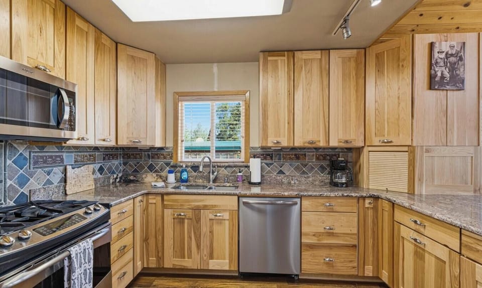 Enjoy the full kitchen equipped with modern appliances and essentials.