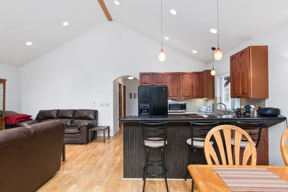 Open living space and vaulted ceilings.