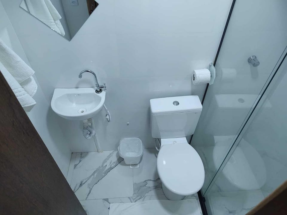 Twin Room | Bathroom | Shower, towels, soap, toilet paper